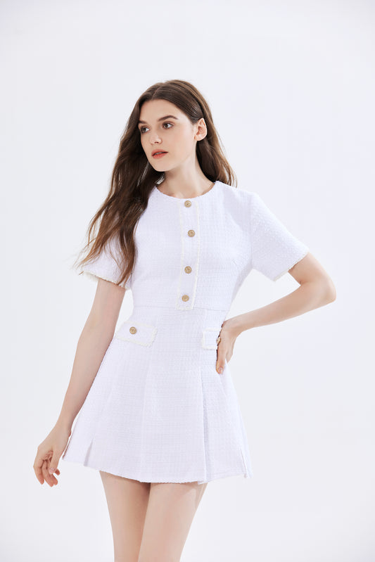 White Daisy mini dress with short sleeves, button-up front, and A-line design.